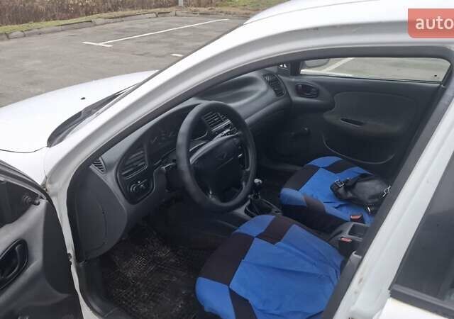 Белый Дэу Ланос, объемом двигателя 1.5 л и пробегом 300 тыс. км за 1200 $, фото 7 на Automoto.ua