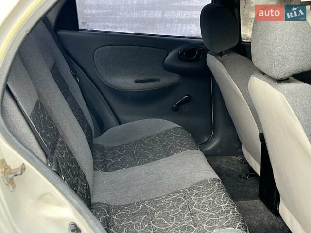 Белый Дэу Ланос, объемом двигателя 1.5 л и пробегом 310 тыс. км за 1250 $, фото 12 на Automoto.ua