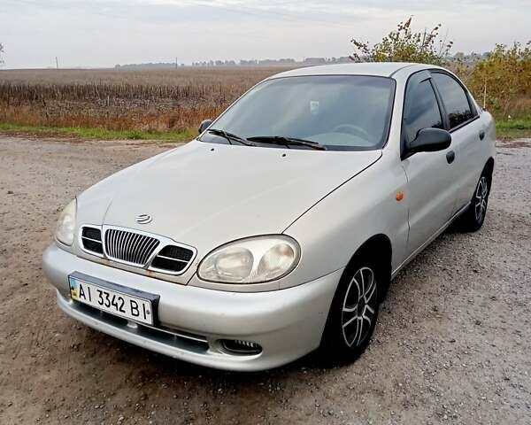 Белый Дэу Ланос, объемом двигателя 1.6 л и пробегом 310 тыс. км за 2300 $, фото 1 на Automoto.ua