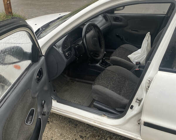 Белый Дэу Ланос, объемом двигателя 0 л и пробегом 300 тыс. км за 1200 $, фото 6 на Automoto.ua