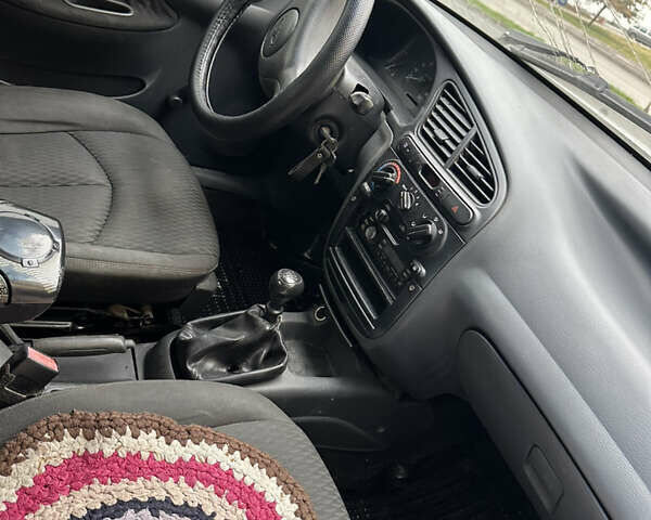 Білий Деу Ланос, об'ємом двигуна 1.5 л та пробігом 222 тис. км за 1350 $, фото 4 на Automoto.ua