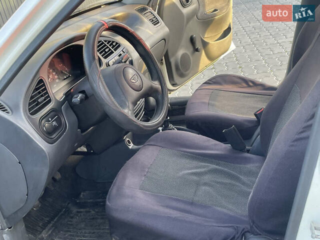 Білий Деу Ланос, об'ємом двигуна 1.5 л та пробігом 185 тис. км за 1690 $, фото 16 на Automoto.ua