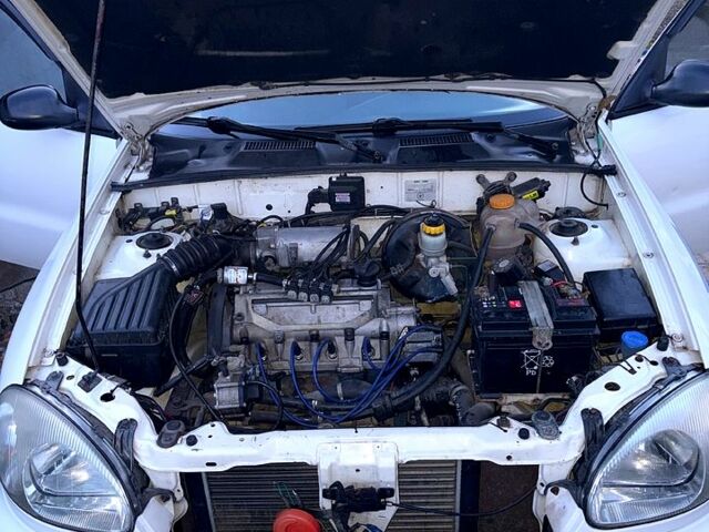 Белый Дэу Ланос, объемом двигателя 1.4 л и пробегом 250 тыс. км за 1800 $, фото 2 на Automoto.ua