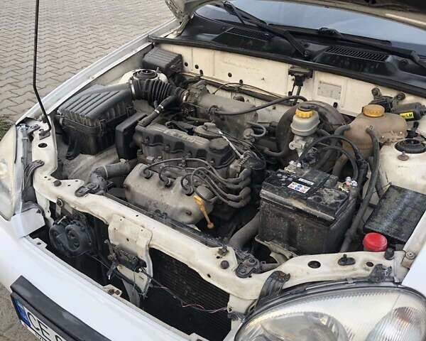 Белый Дэу Ланос, объемом двигателя 1.5 л и пробегом 160 тыс. км за 2200 $, фото 7 на Automoto.ua