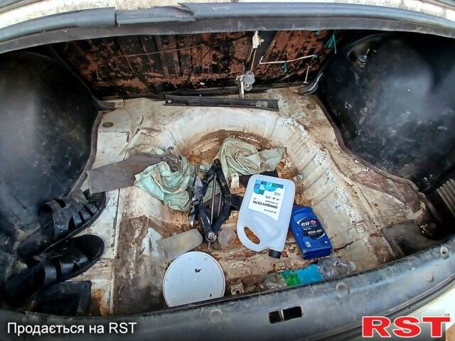 Білий Деу Ланос, об'ємом двигуна 1.4 л та пробігом 230 тис. км за 1250 $, фото 13 на Automoto.ua