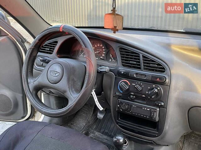 Білий Деу Ланос, об'ємом двигуна 1.5 л та пробігом 185 тис. км за 1690 $, фото 20 на Automoto.ua