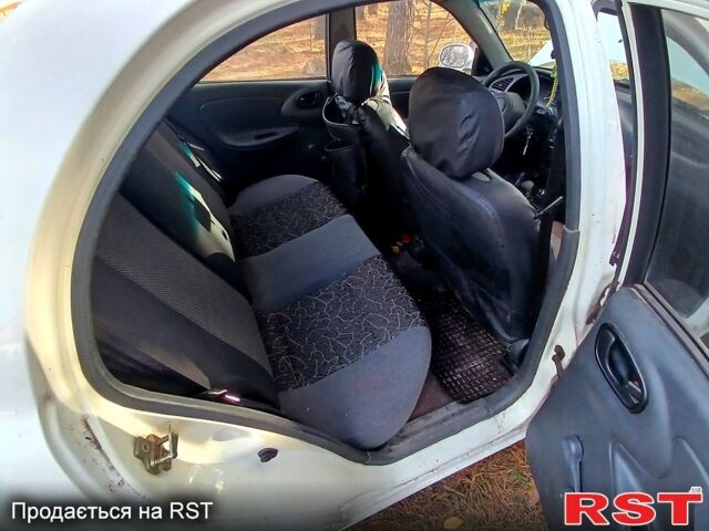 Белый Дэу Ланос, объемом двигателя 1.4 л и пробегом 230 тыс. км за 1250 $, фото 9 на Automoto.ua