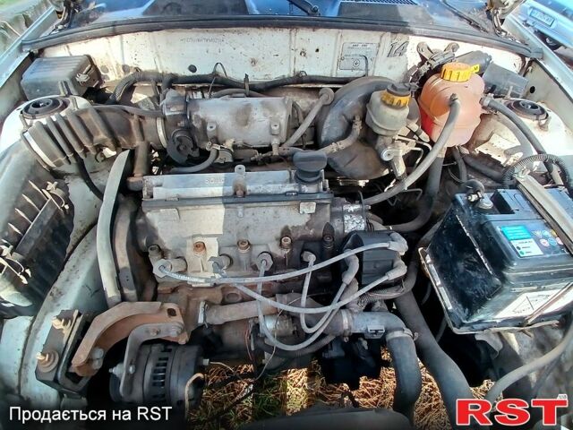 Белый Дэу Ланос, объемом двигателя 1.4 л и пробегом 230 тыс. км за 1250 $, фото 6 на Automoto.ua