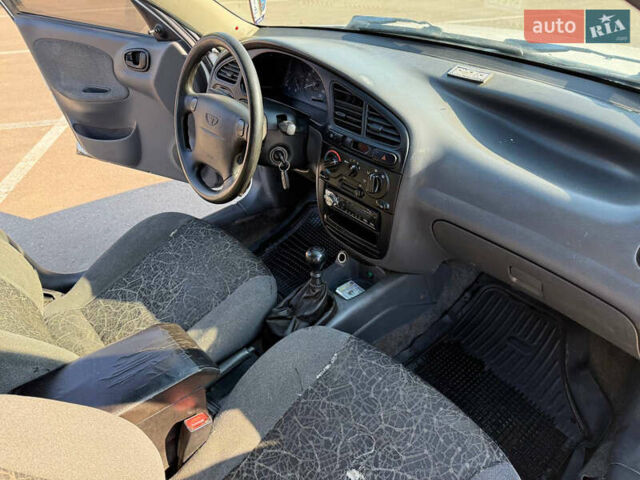 Белый Дэу Ланос, объемом двигателя 1.6 л и пробегом 250 тыс. км за 1300 $, фото 6 на Automoto.ua