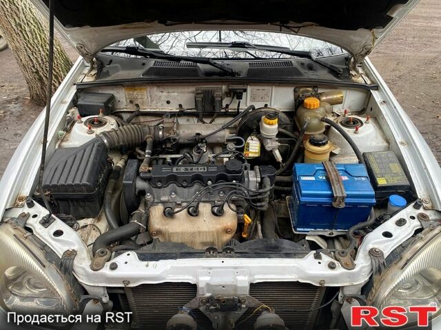 Білий Деу Ланос, об'ємом двигуна 1.5 л та пробігом 259 тис. км за 2400 $, фото 12 на Automoto.ua