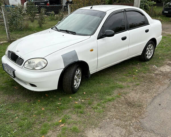 Білий Деу Ланос, об'ємом двигуна 1.39 л та пробігом 255 тис. км за 1800 $, фото 1 на Automoto.ua