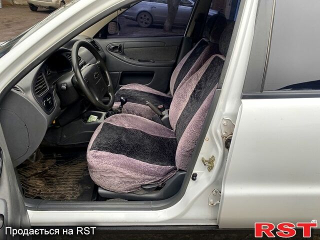 Білий Деу Ланос, об'ємом двигуна 1.5 л та пробігом 259 тис. км за 2400 $, фото 10 на Automoto.ua