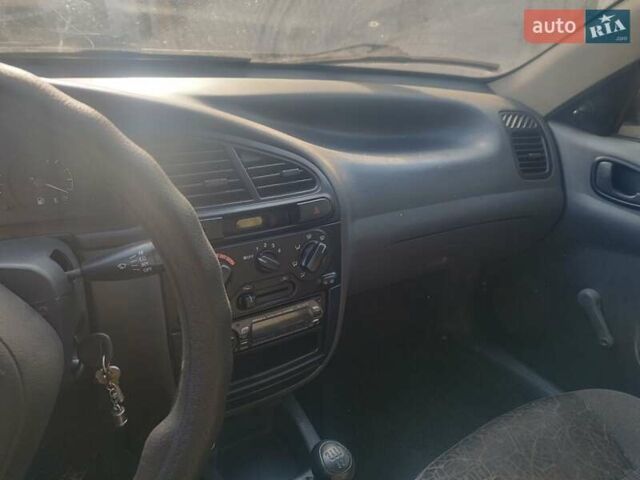Белый Дэу Ланос, объемом двигателя 1.5 л и пробегом 155 тыс. км за 2999 $, фото 3 на Automoto.ua