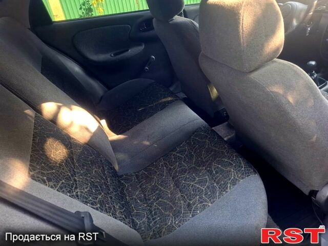 Белый Дэу Ланос, объемом двигателя 1.5 л и пробегом 225 тыс. км за 2000 $, фото 5 на Automoto.ua