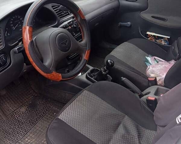 Білий Деу Ланос, об'ємом двигуна 1.39 л та пробігом 150 тис. км за 2000 $, фото 2 на Automoto.ua