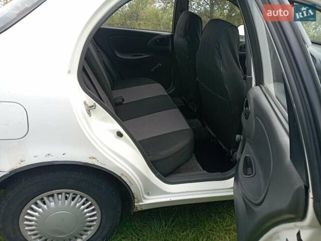 Білий Деу Ланос, об'ємом двигуна 1.39 л та пробігом 216 тис. км за 1500 $, фото 1 на Automoto.ua