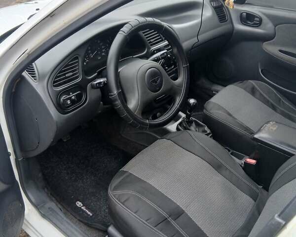 Білий Деу Ланос, об'ємом двигуна 1.5 л та пробігом 179 тис. км за 1700 $, фото 8 на Automoto.ua