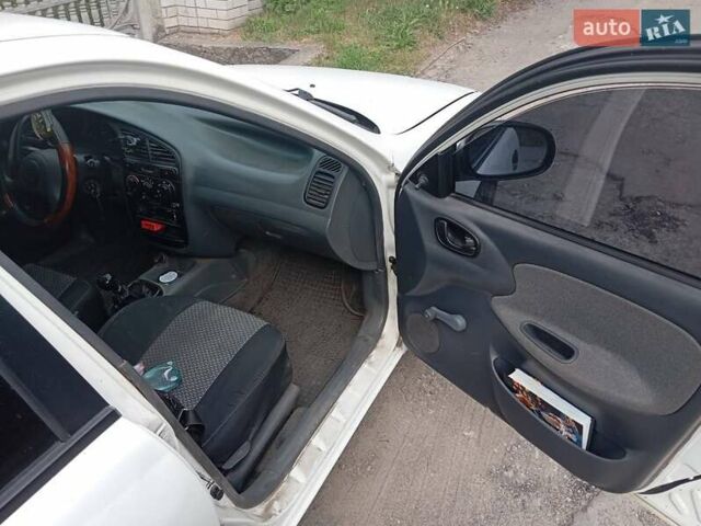 Білий Деу Ланос, об'ємом двигуна 1.39 л та пробігом 150 тис. км за 2000 $, фото 14 на Automoto.ua