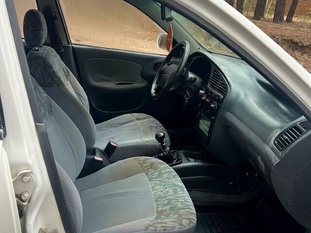 Белый Дэу Ланос, объемом двигателя 1.6 л и пробегом 205 тыс. км за 1700 $, фото 9 на Automoto.ua