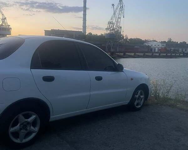 Белый Дэу Ланос, объемом двигателя 1.5 л и пробегом 228 тыс. км за 2100 $, фото 1 на Automoto.ua