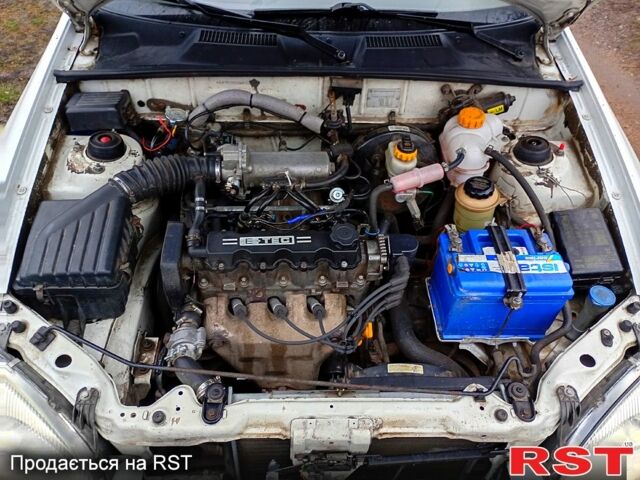 Белый Дэу Ланос, объемом двигателя 1.5 л и пробегом 230 тыс. км за 2750 $, фото 12 на Automoto.ua