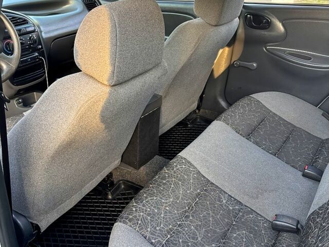 Белый Дэу Ланос, объемом двигателя 1.4 л и пробегом 150 тыс. км за 2000 $, фото 9 на Automoto.ua