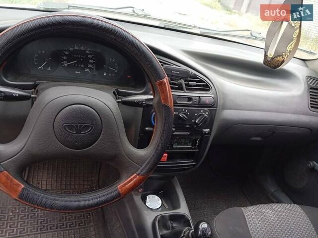 Білий Деу Ланос, об'ємом двигуна 1.39 л та пробігом 150 тис. км за 2000 $, фото 1 на Automoto.ua