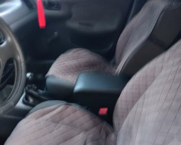 Белый Дэу Ланос, объемом двигателя 1.39 л и пробегом 127 тыс. км за 2450 $, фото 9 на Automoto.ua