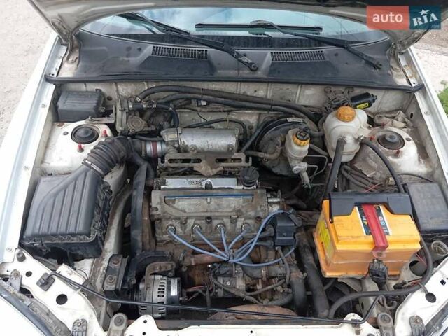 Білий Деу Ланос, об'ємом двигуна 1.39 л та пробігом 150 тис. км за 2000 $, фото 16 на Automoto.ua