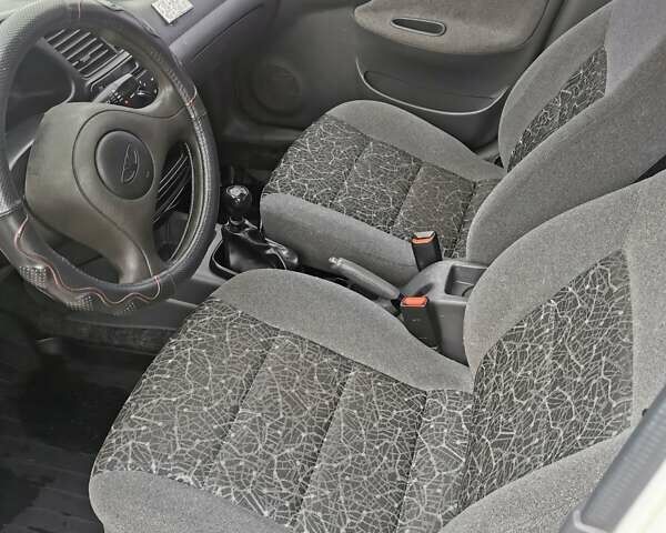 Деу Ланос 2008 у Кривому Розі на Automoto.ua Білий Деу Ланос, об'ємом двигуна 1.5 л та пробігом 189 тис. км за 2700 $, фото 9 на Automoto.ua