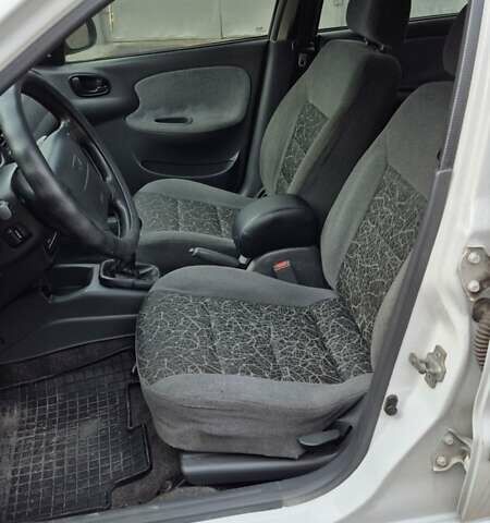 Белый Дэу Ланос, объемом двигателя 1.6 л и пробегом 183 тыс. км за 2200 $, фото 2 на Automoto.ua