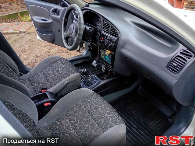 Белый Дэу Ланос, объемом двигателя 1.5 л и пробегом 230 тыс. км за 2750 $, фото 10 на Automoto.ua