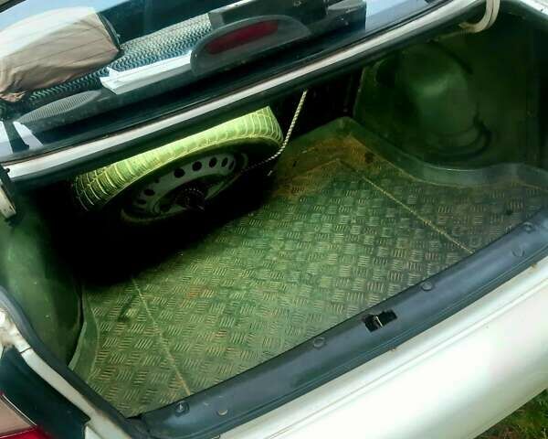 Белый Дэу Ланос, объемом двигателя 1.5 л и пробегом 150 тыс. км за 1520 $, фото 6 на Automoto.ua