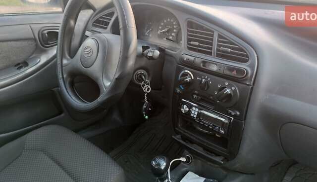 Белый Дэу Ланос, объемом двигателя 1.5 л и пробегом 160 тыс. км за 2250 $, фото 6 на Automoto.ua