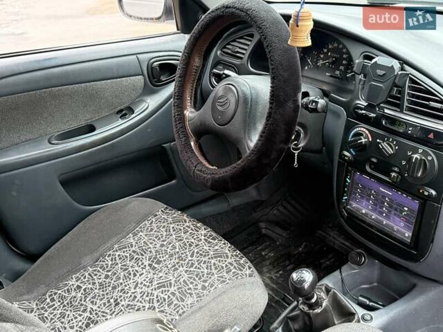 Білий Деу Ланос, об'ємом двигуна 1.5 л та пробігом 210 тис. км за 2350 $, фото 12 на Automoto.ua