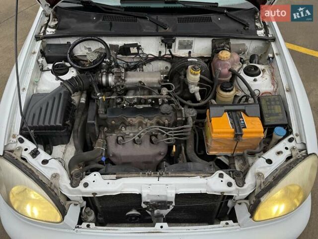 Білий Деу Ланос, об'ємом двигуна 1.5 л та пробігом 210 тис. км за 2350 $, фото 15 на Automoto.ua