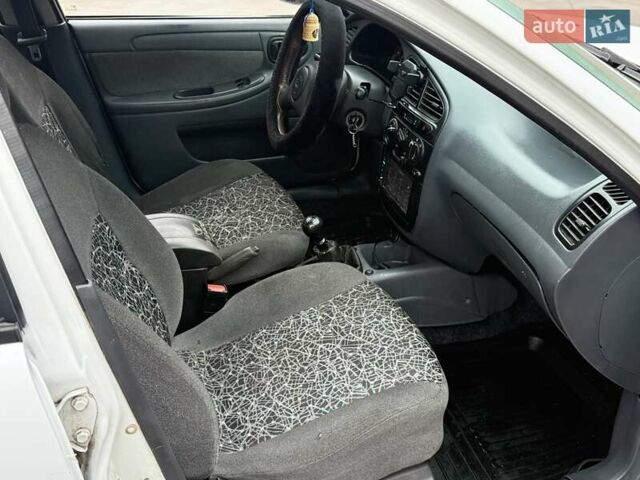 Білий Деу Ланос, об'ємом двигуна 1.5 л та пробігом 210 тис. км за 2350 $, фото 11 на Automoto.ua