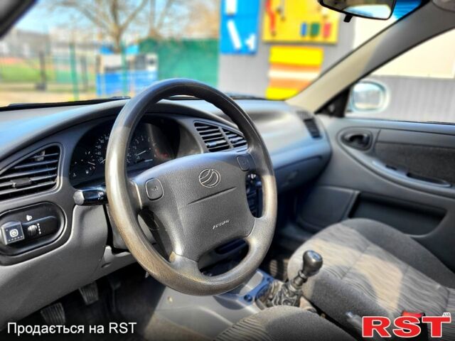 Білий Деу Ланос, об'ємом двигуна 1.5 л та пробігом 100 тис. км за 3500 $, фото 6 на Automoto.ua