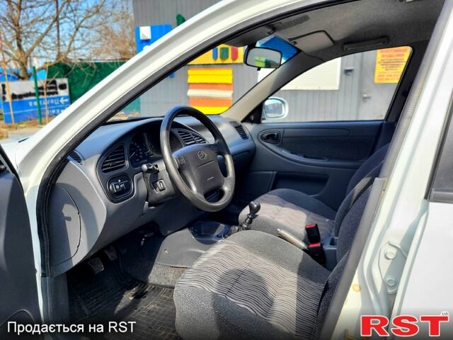 Білий Деу Ланос, об'ємом двигуна 1.5 л та пробігом 100 тис. км за 3500 $, фото 8 на Automoto.ua