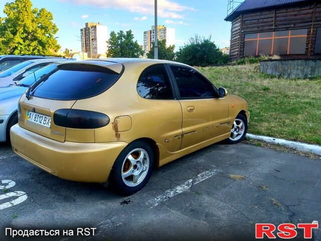 Бежевий Деу Ланос, об'ємом двигуна 1.6 л та пробігом 280 тис. км за 1500 $, фото 3 на Automoto.ua