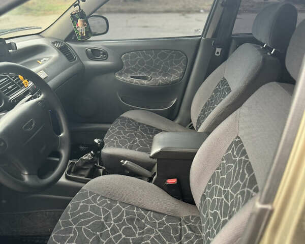 Бежевий Деу Ланос, об'ємом двигуна 1.5 л та пробігом 214 тис. км за 2850 $, фото 3 на Automoto.ua
