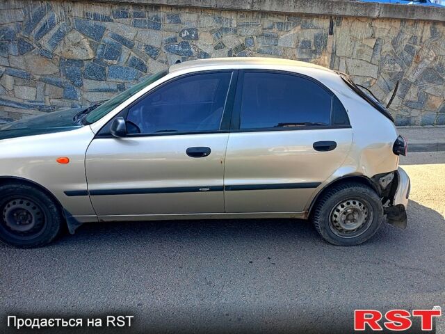 Бежевый Дэу Ланос, объемом двигателя 1.5 л и пробегом 262 тыс. км за 600 $, фото 1 на Automoto.ua
