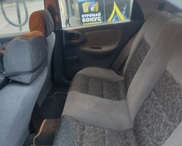 Бежевий Деу Ланос, об'ємом двигуна 1.5 л та пробігом 198 тис. км за 2200 $, фото 5 на Automoto.ua
