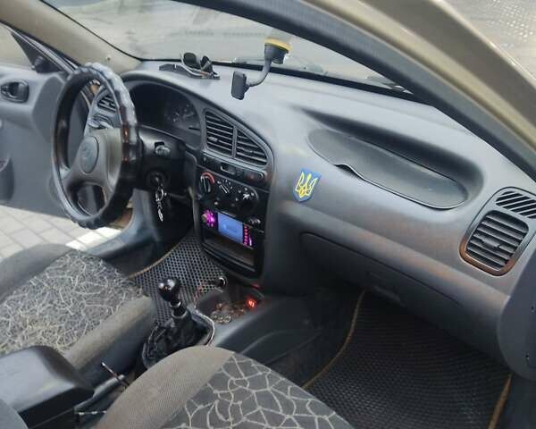 Бежевий Деу Ланос, об'ємом двигуна 1.5 л та пробігом 198 тис. км за 2200 $, фото 6 на Automoto.ua