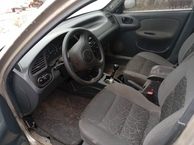 Бежевый Дэу Ланос, объемом двигателя 1.5 л и пробегом 300 тыс. км за 829 $, фото 4 на Automoto.ua