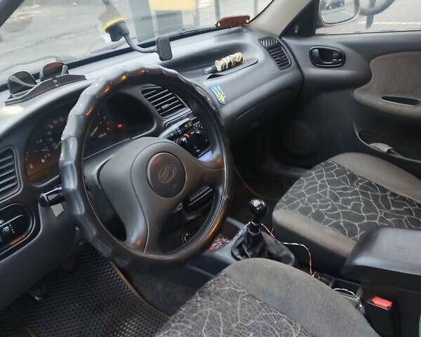 Бежевий Деу Ланос, об'ємом двигуна 1.5 л та пробігом 198 тис. км за 2200 $, фото 4 на Automoto.ua