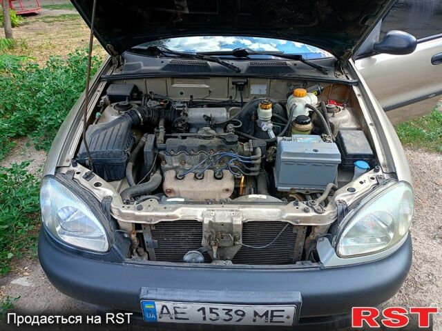 Бежевый Дэу Ланос, объемом двигателя 1.5 л и пробегом 262 тыс. км за 600 $, фото 2 на Automoto.ua