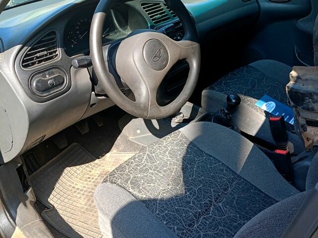 Бежевый Дэу Ланос, объемом двигателя 1.5 л и пробегом 262 тыс. км за 600 $, фото 3 на Automoto.ua