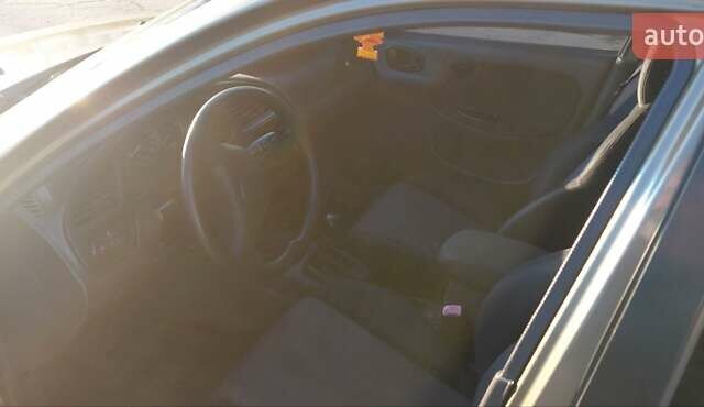 Бежевый Дэу Ланос, объемом двигателя 1.5 л и пробегом 298 тыс. км за 3300 $, фото 9 на Automoto.ua