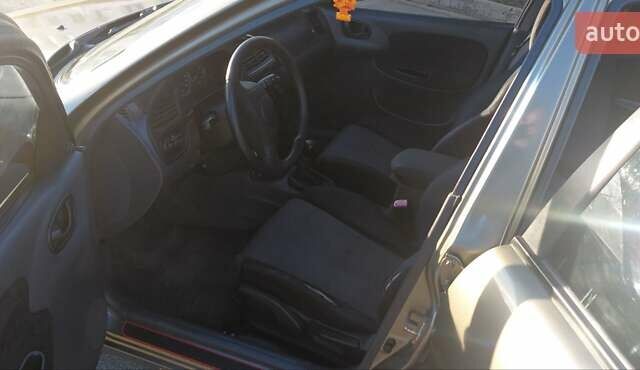 Бежевый Дэу Ланос, объемом двигателя 1.5 л и пробегом 298 тыс. км за 3300 $, фото 13 на Automoto.ua